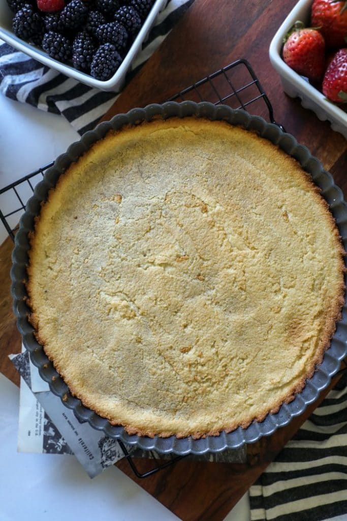 keto sugar cookie pizza crust in a pan. 