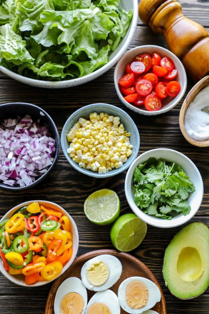 Southwest fiesta salsa ingredients in little bowls 