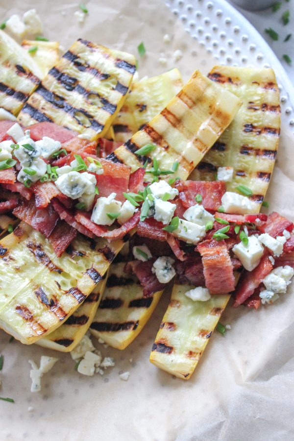 A plate of squash, with Bacon and Blue cheese