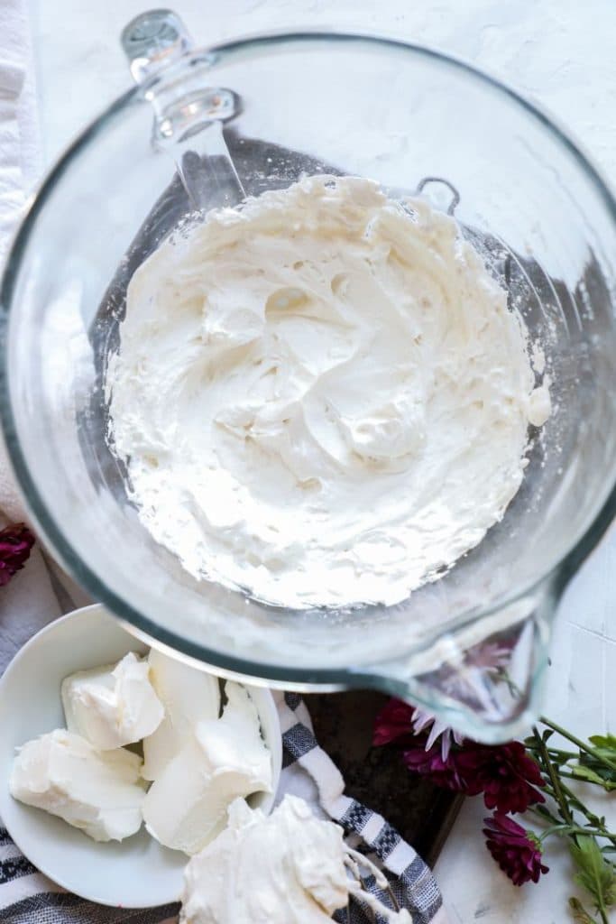 Whipped Keto ice cream base in a glass mixing bowl.