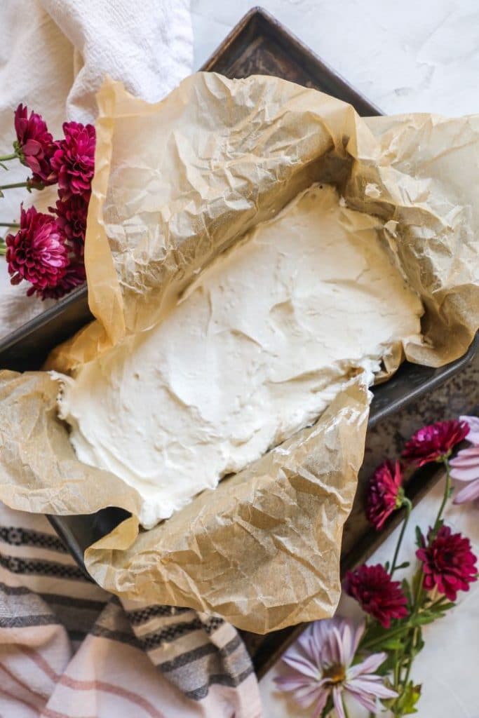 A container with keto vanilla ice cream.