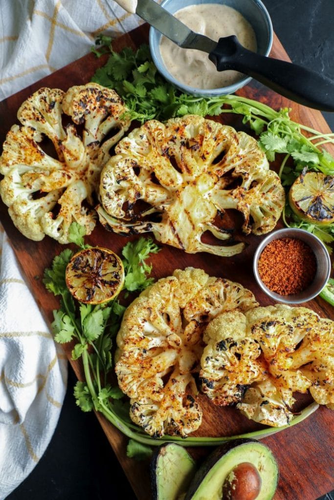 A plate of elote cauliflower steaks.