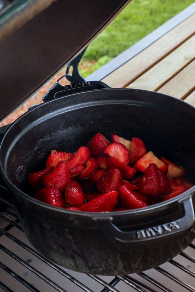 This simple and versatile homemade strawberry sauce on the grill, takes a classic delicious topping, over the top! By combining the classic sweet and tangy fresh strawberries with classic smoke flavors you can create a unique recipe for desserts and savory dishes alike.