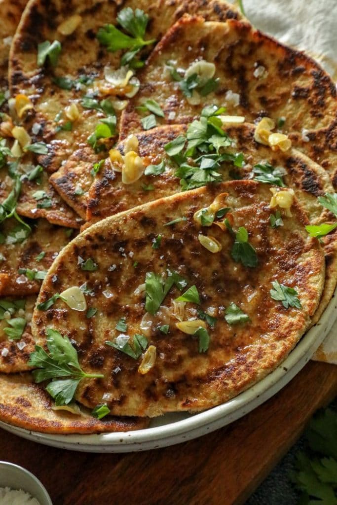 Flatbread made garlic naan style with butter and parsley