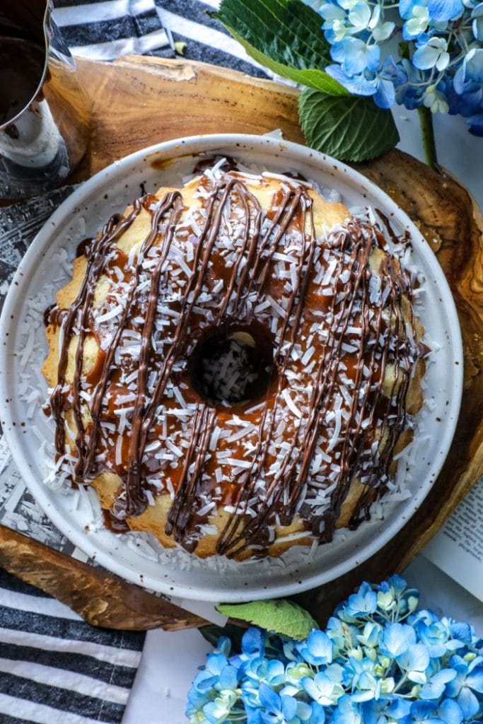 A large keto samoa bundt cake on a plate.