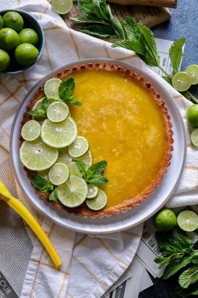 Keto key Lime Tart with lime rounds over the top.