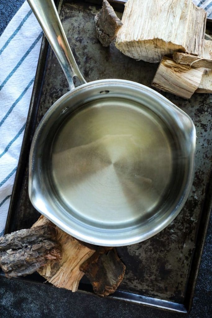 A pot with the dissolved simple syrup in it.