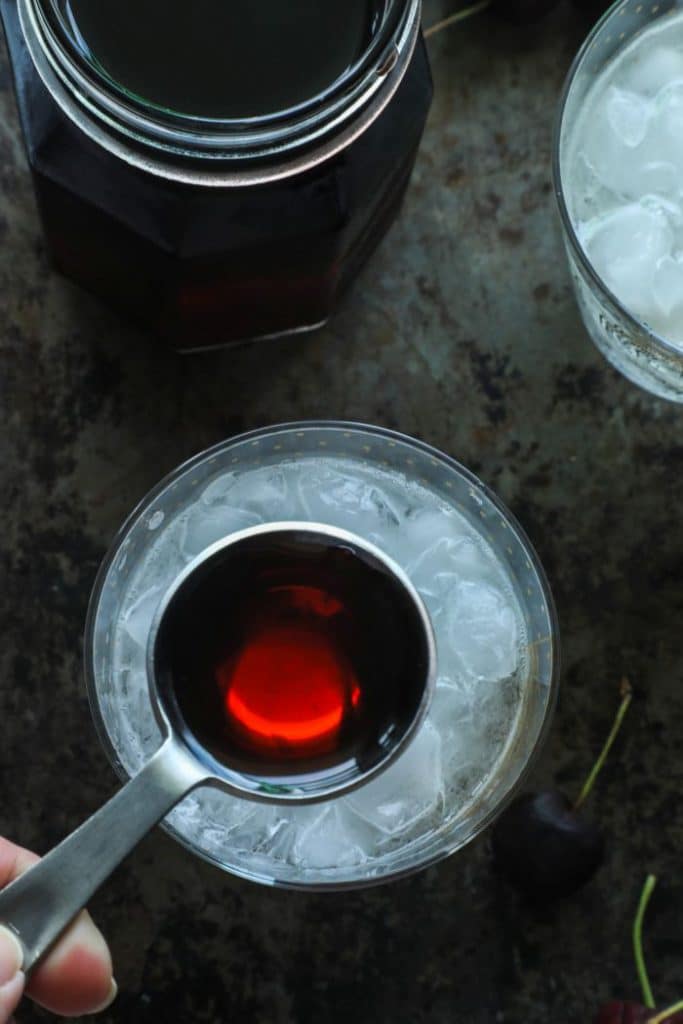 A tablespoon of Keto Grenadine Cocktail Syrup.