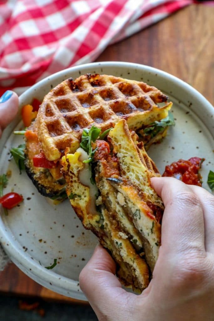 Crispy Keto Ricotta Stuffed Eggplant Rounds on a chaffle bun