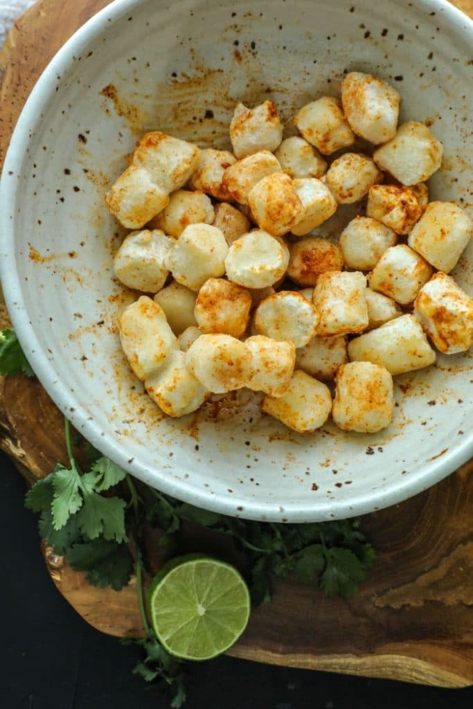 A bowl of seasoned cauliflower gnocchi