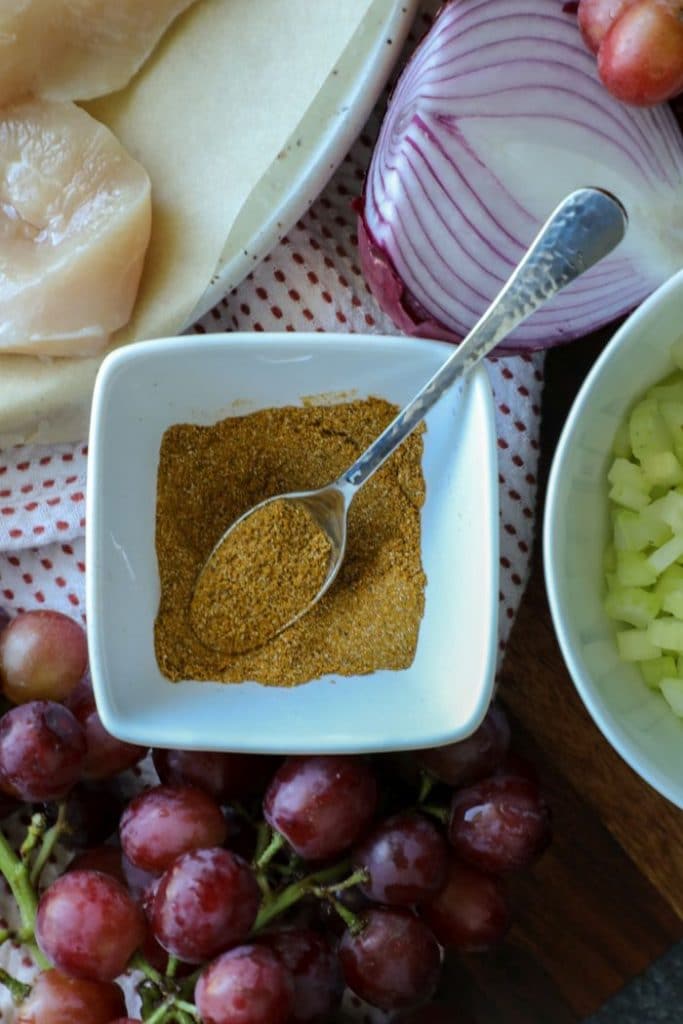 Curry spice in a bowl for the grilled curry chicken salad.