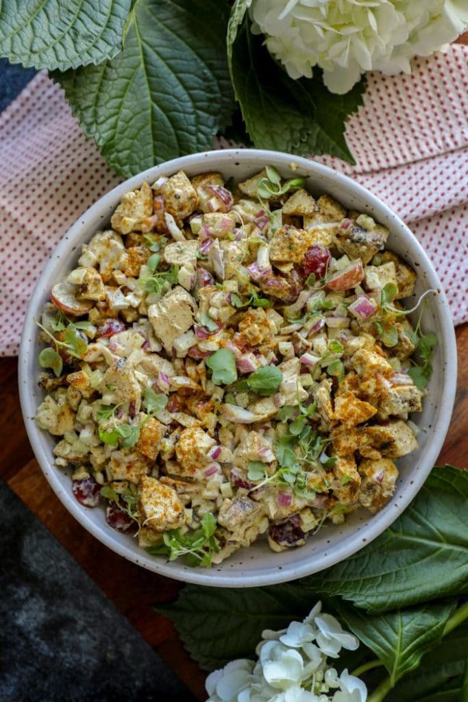 A large white bowl filled with grilled curry chicken salad (keto whole 30)