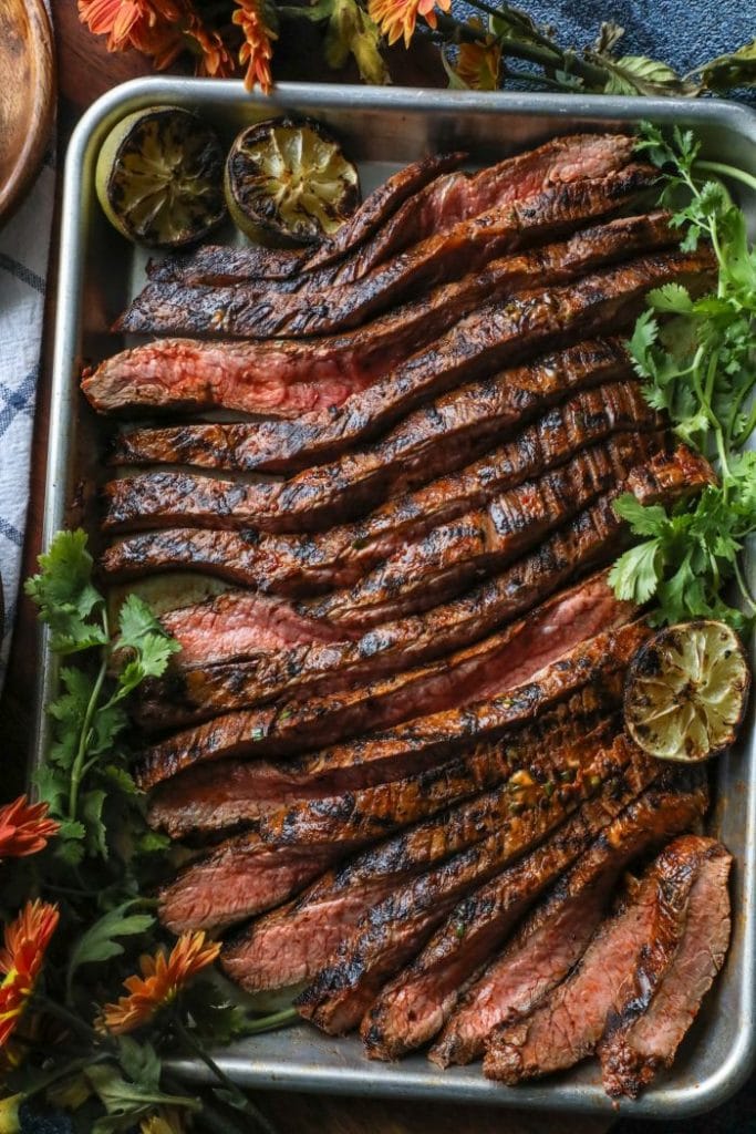Easy Grilled Adobo Marinated Flank Steak sliced thinly into strips.