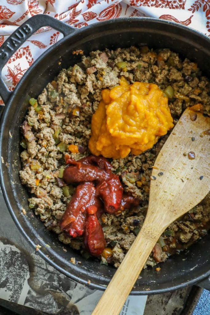 Cooked ground turkey and veggies mixed with pumpkin puree and chipotle and adobo.