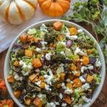 Shredded Brussel Sprouts and Roasted Vegetable Salad in a large white bowl