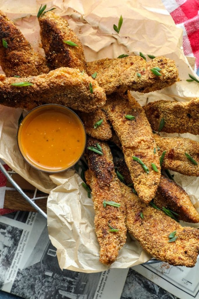 Cajun chicken tenders with the Cajun BBQ dry rub in a basket.