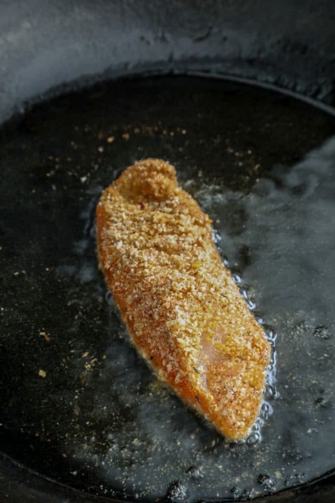 Shallow pan frying a cajun almond flour chicken tender
