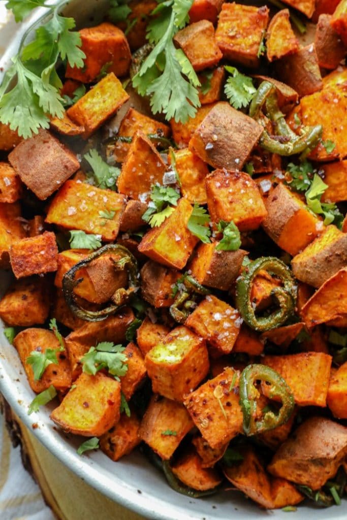 Baked Spicy and Smoky Cumin Roasted Sweet Potatoes in a bowl. 
