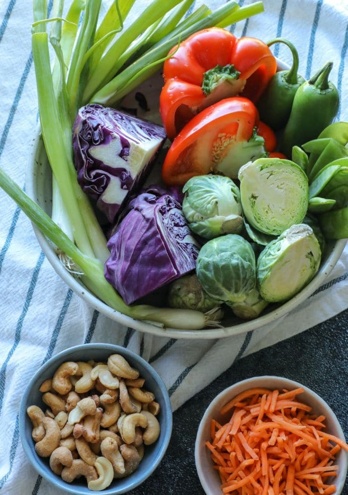 Easy Brussel Sprout Fish Taco Slaw Recipe ingredients on a table.