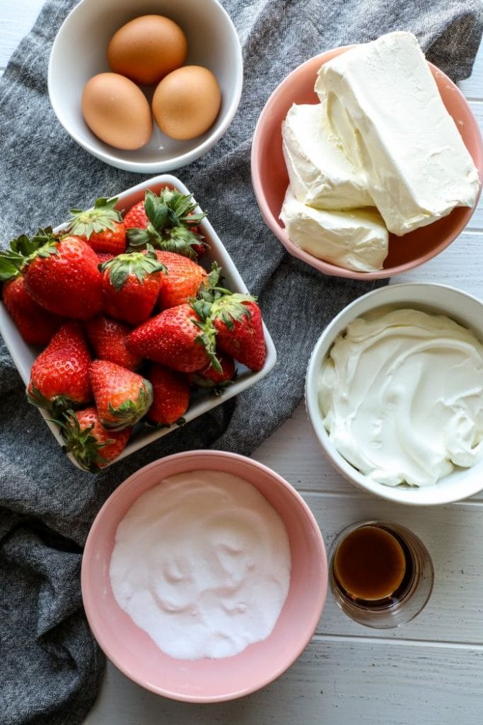 Easy Keto Strawberry Cheesecake Bar ingredients on a table.