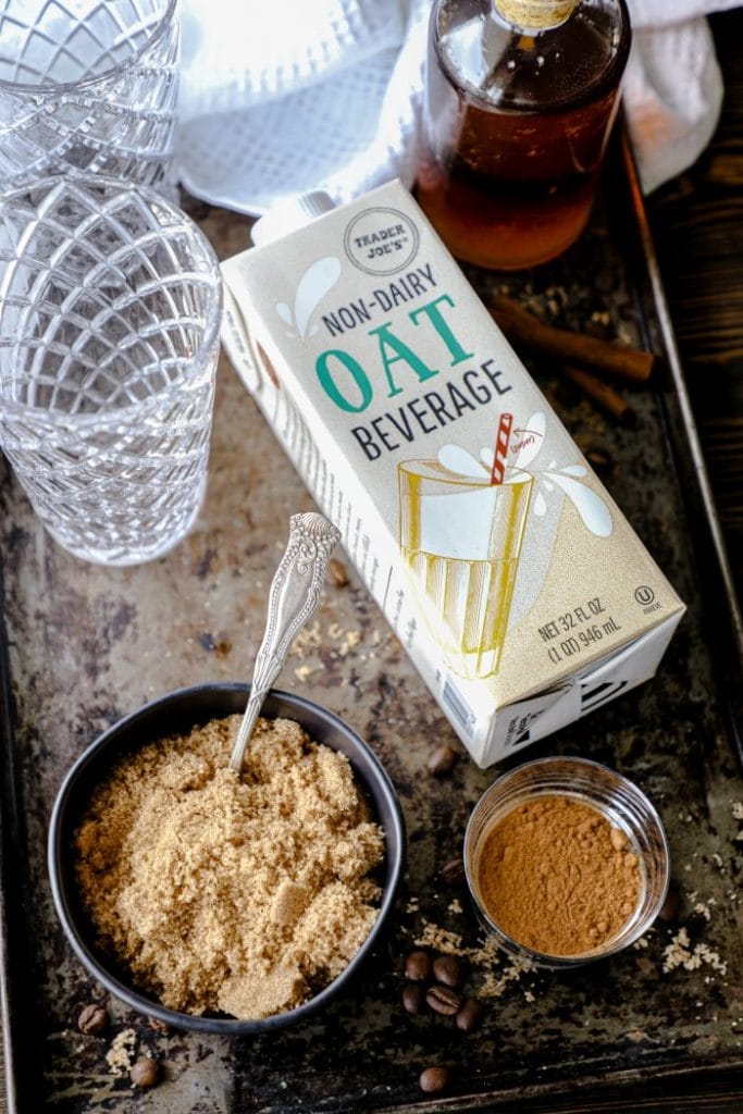 Homemade Sugar Free Iced Oat Milk Shaken Espresso ingredients on a tray.