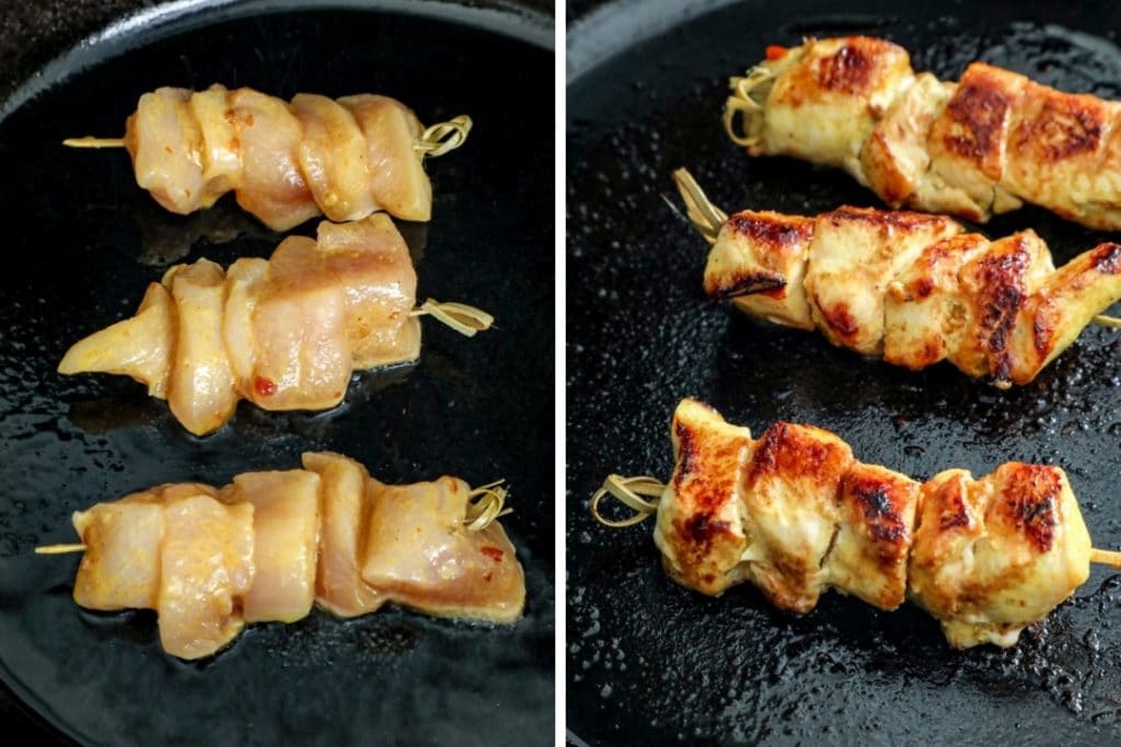 Easy One Pan Thai Inspired Satay Chicken being cooked and seared in the cast iron pan.