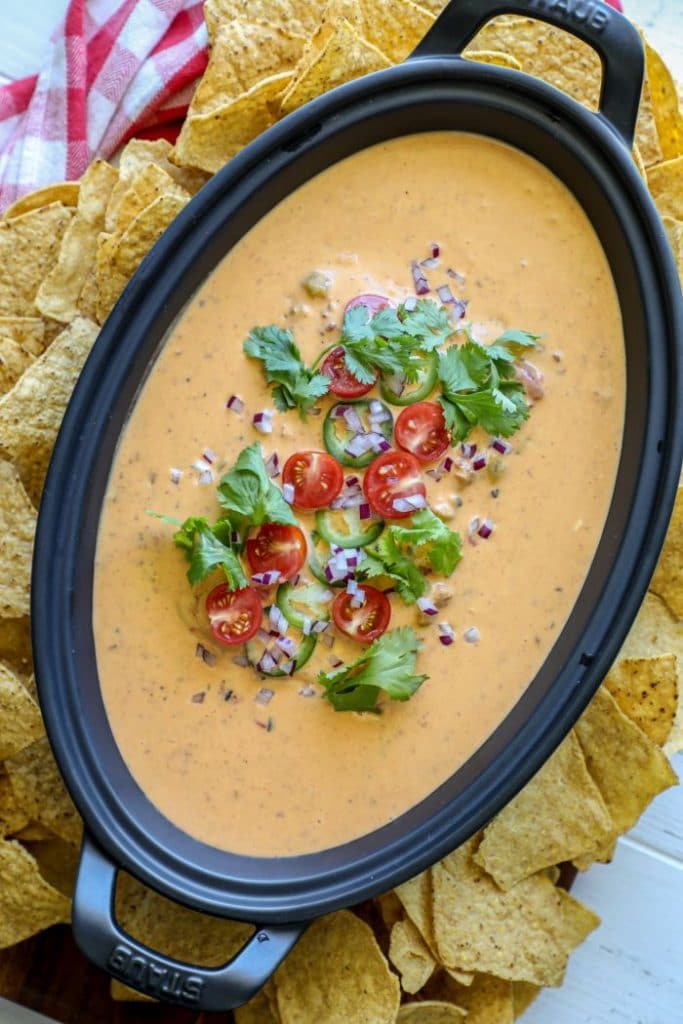 Smoked queso on the big green egg in a dish with chips