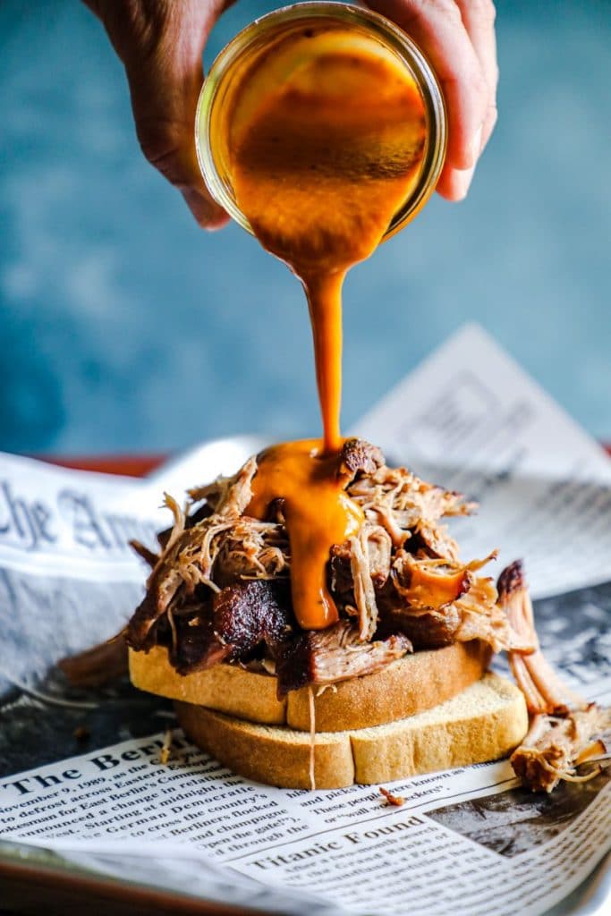 Mustard BBQ sauce poured over pulled pork