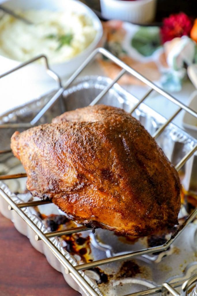 Smoked Turkey Breast on a roasting rack unsliced