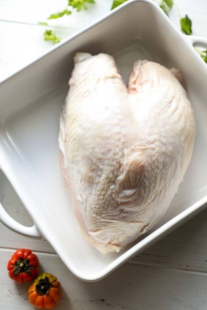 Raw, defrosted turkey breast before injecting