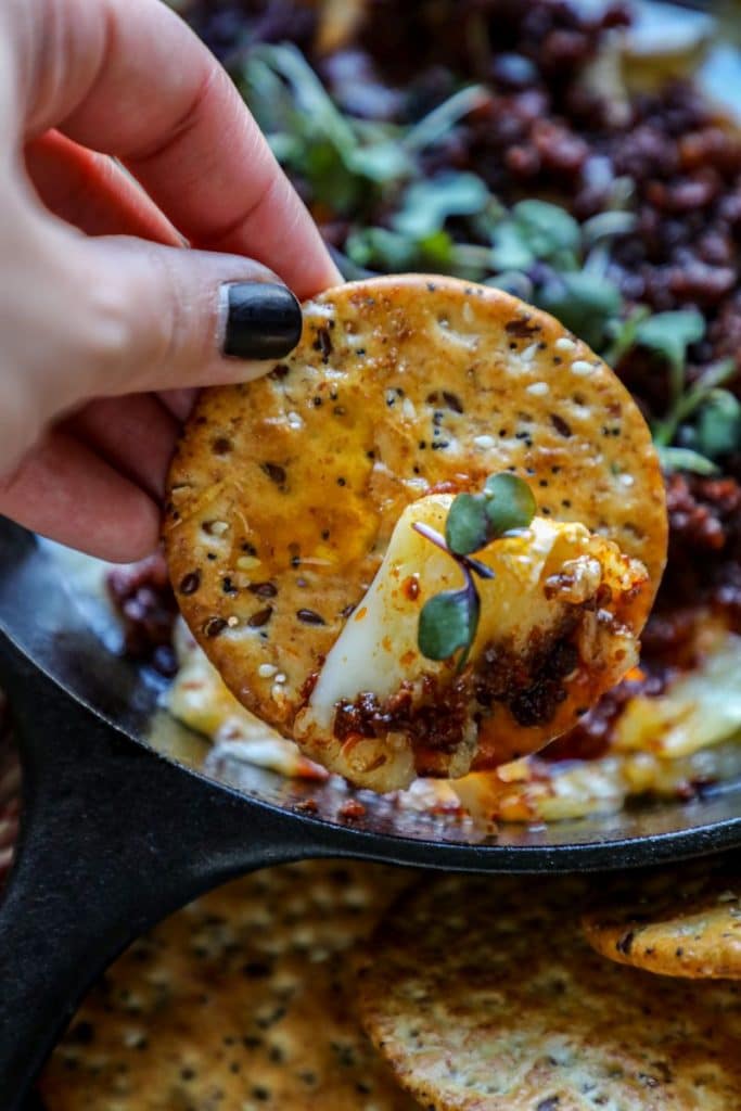 Smoked Brie dipped with a cracker