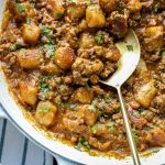 Cauliflower gnocchi cheeseburger skillet with a spoon in it