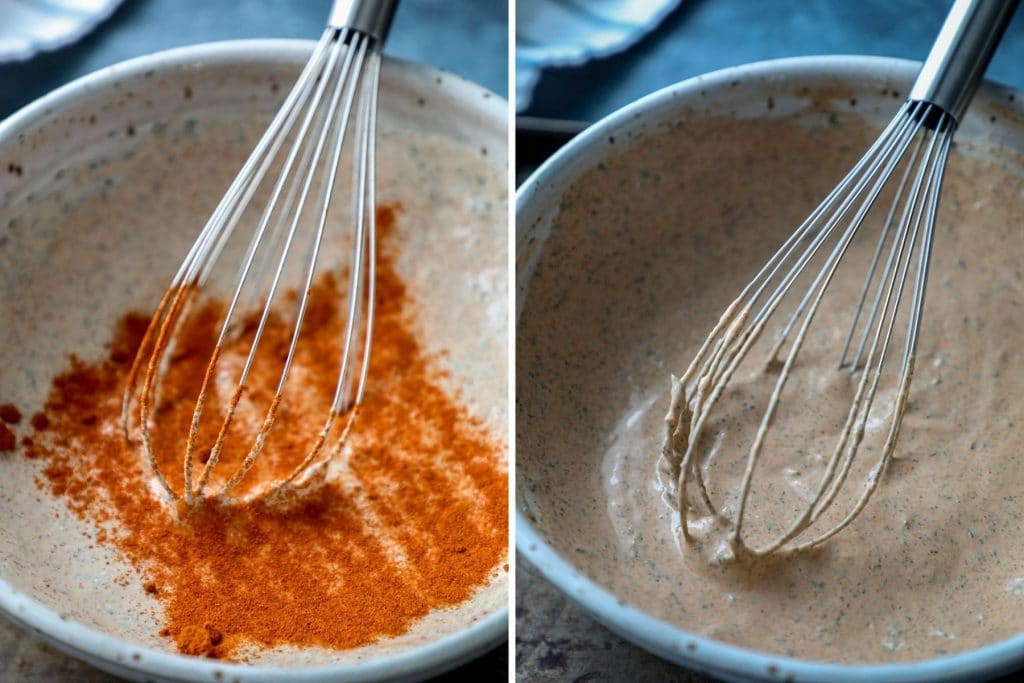 Whisking the dressing in a bowl