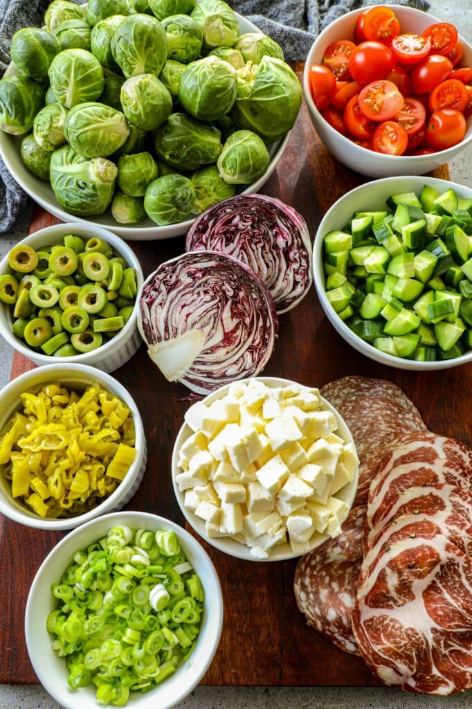 Italian Shredded Brussels Sprout Salad ingredients on a table 