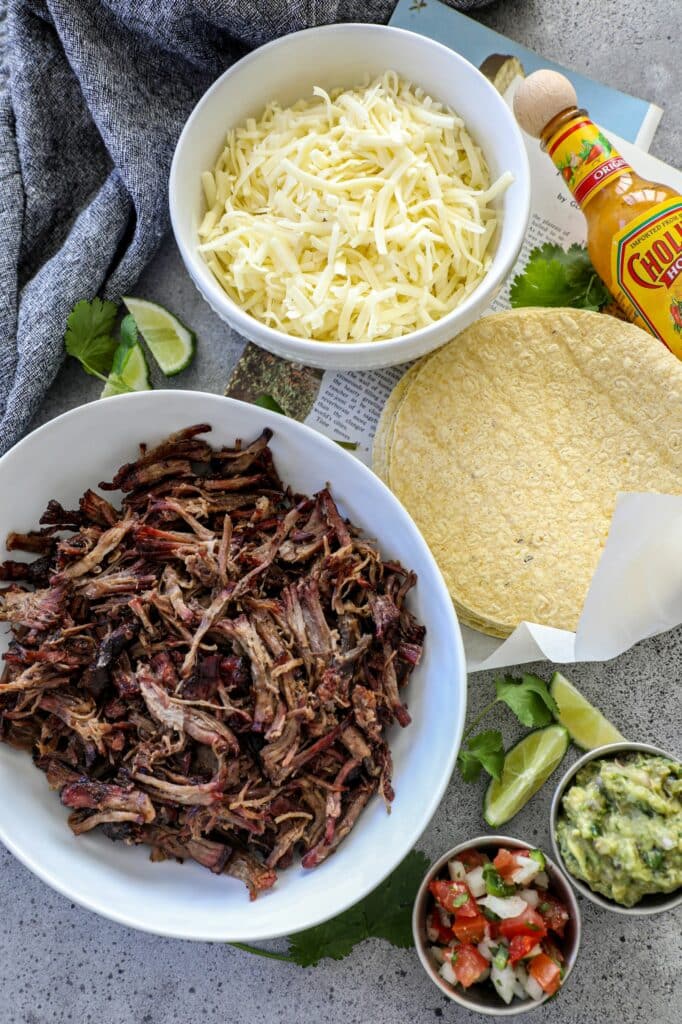 Air fryer flauta ingredients with shredded smoked beef.