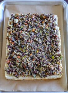 Base buns with olive salad over the top