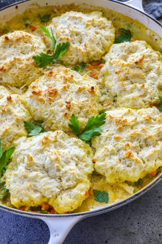 Dutch Oven Chicken and Biscuits in a skillet after being baked. 