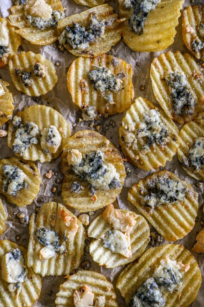 Blue cheese baked onto potato chips 