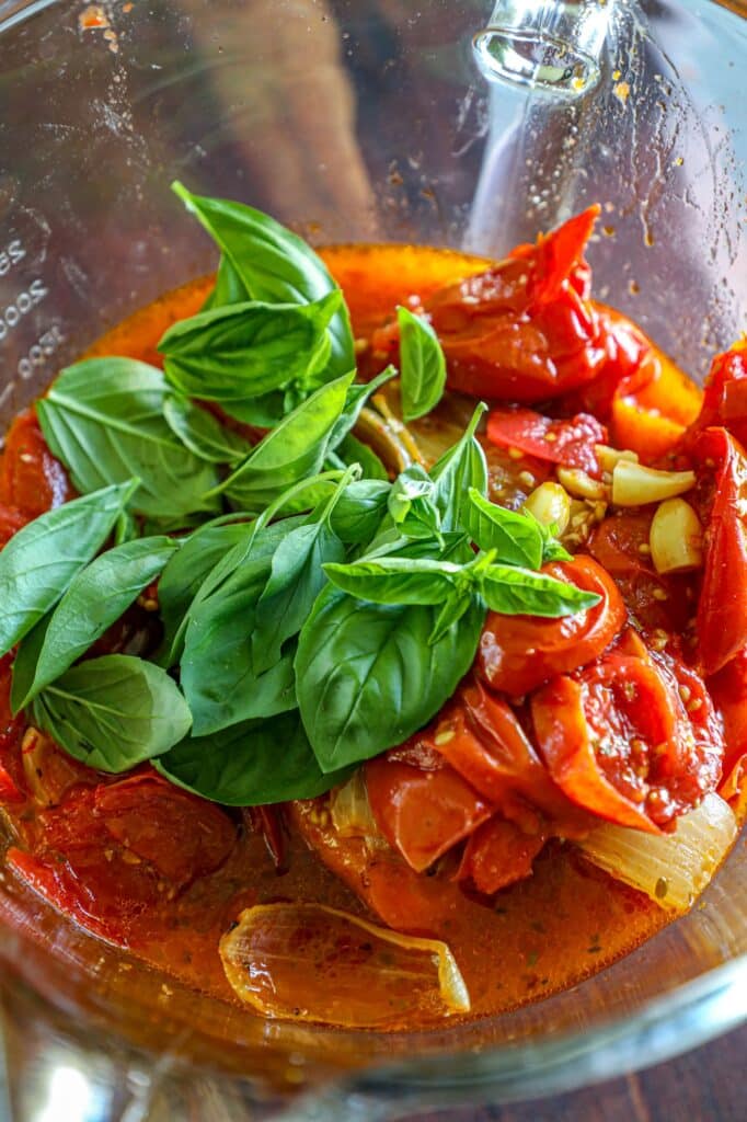 Blending all the ingredients together to make a smooth sauce 
