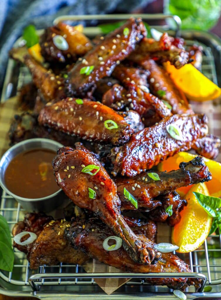 Smoked duck wings with orange sauce for dipping and glazing 